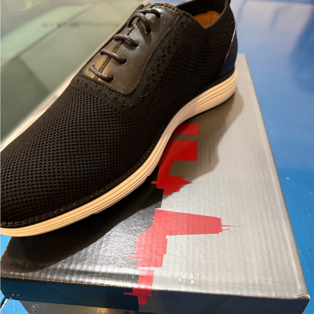 Elegant Black Men's Loafers by Cole Haan